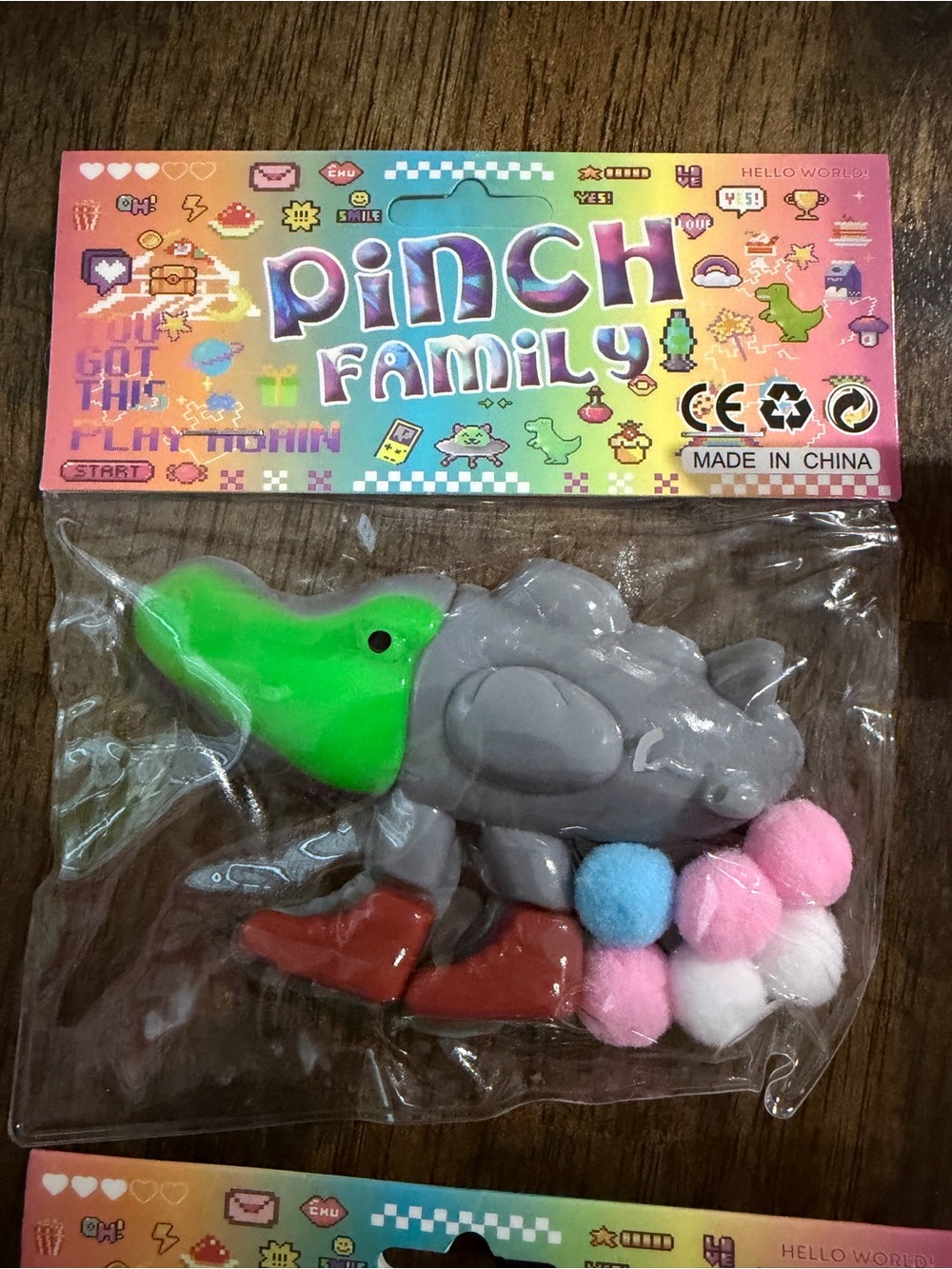 Pinch Family Green-Gray Animal Taba squishy with Pom Poms